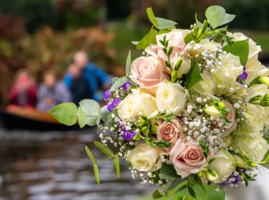 Pastel rose bridal bouquet with white flowers and greenery