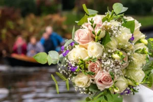 Pastel rose bridal bouquet with white flowers and greenery